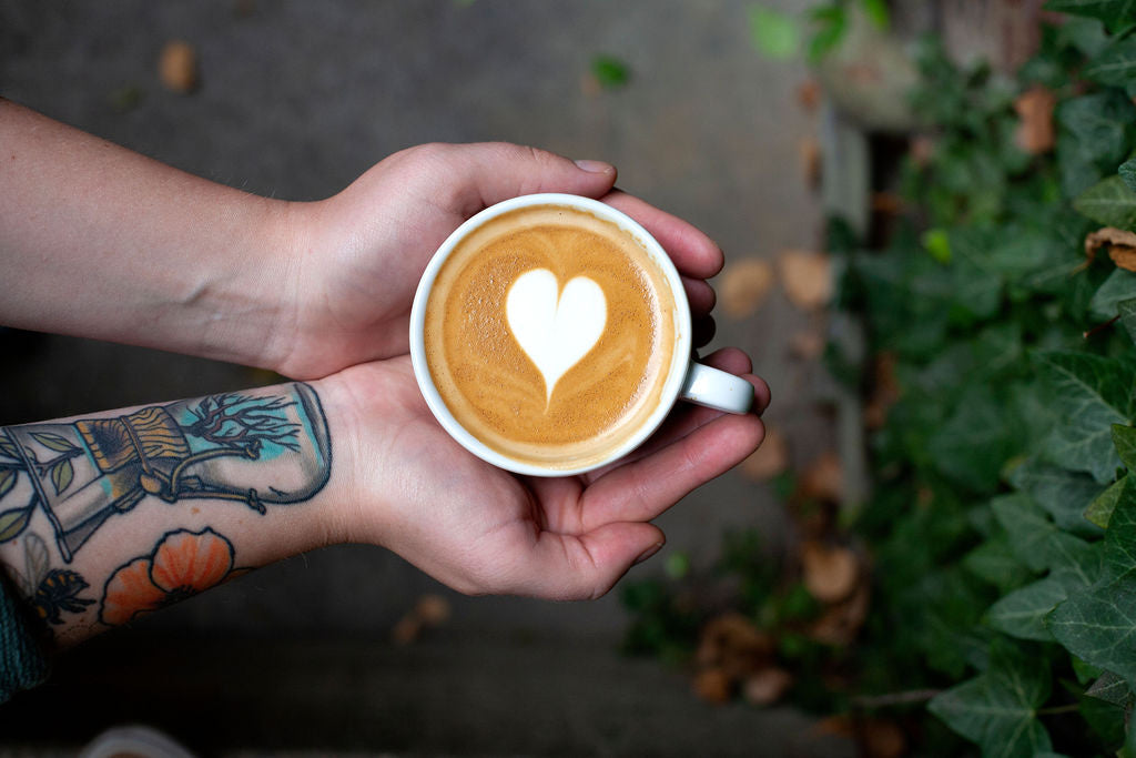 Latte art poured at the cafe
