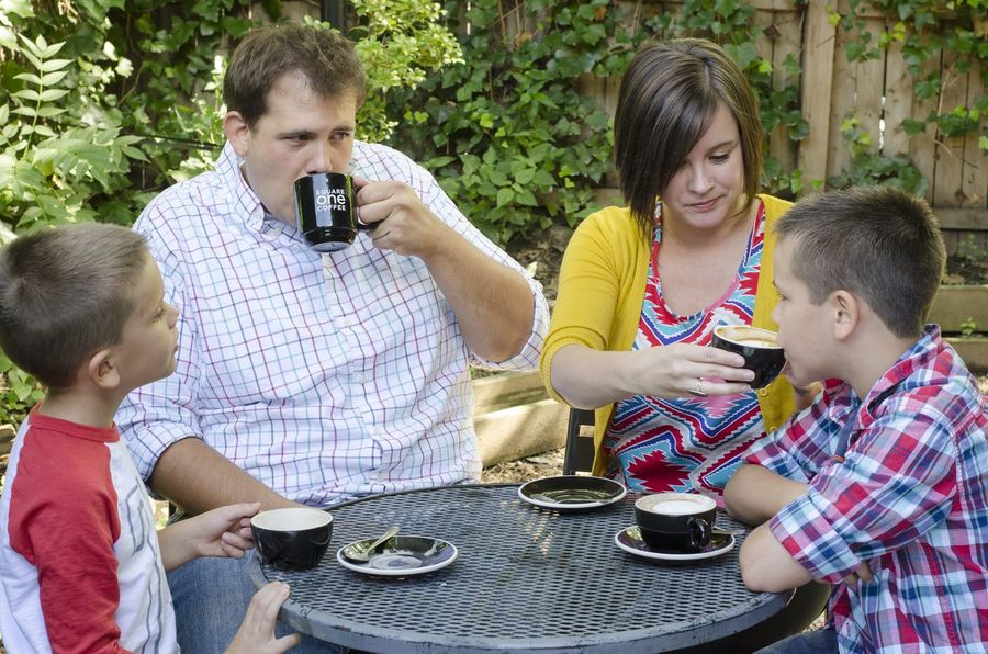 The Steffy family sipping coffee together